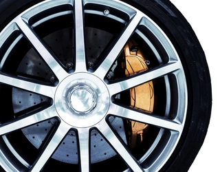 Aluminum wheel with gold anodized caliper Aluminum wheel with gold anodized caliper