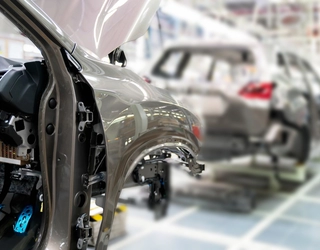 Car being manufactured Car being manufactured